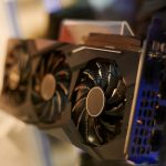 row of many video cards is on sale at showcase in store. graphics chipsets selling concept